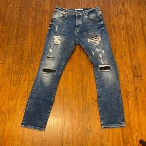 Zara ripped jeans with animal print detail